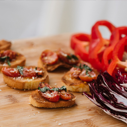 Bruschetta Appetizer with slow cooked tomato and basil