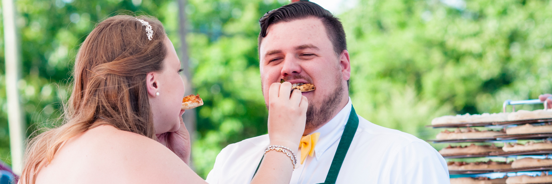 Just Married couple enjoying pizza together